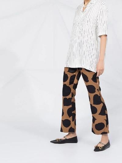 MARNI PRINTED FLARED TROUSERS 