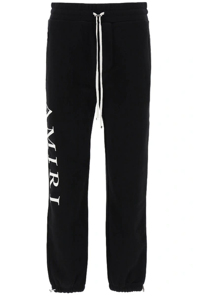 Shop Amiri Sweatpants With Logo In Black (black)