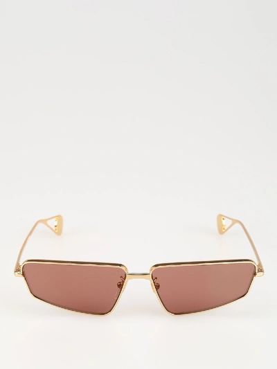 Shop Gucci Gold-colored Sunglasses With Red Lenses