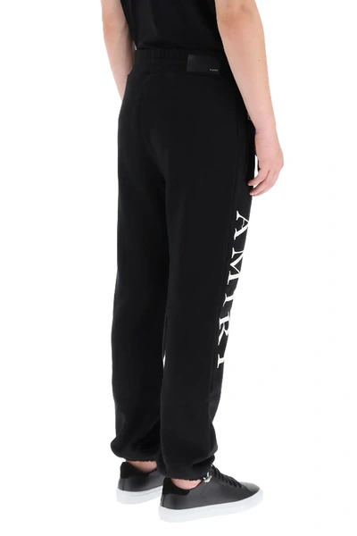 Shop Amiri Sweatpants With Logo In Black