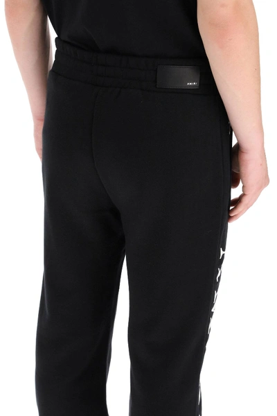 Shop Amiri Sweatpants With Logo In Black