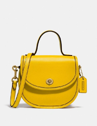 Shop Coach Mini Top Handle Saddle Bag - Women's In B4/lemon
