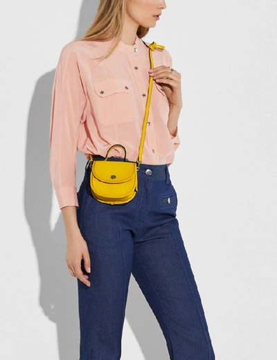 Shop Coach Mini Top Handle Saddle Bag - Women's In B4/lemon