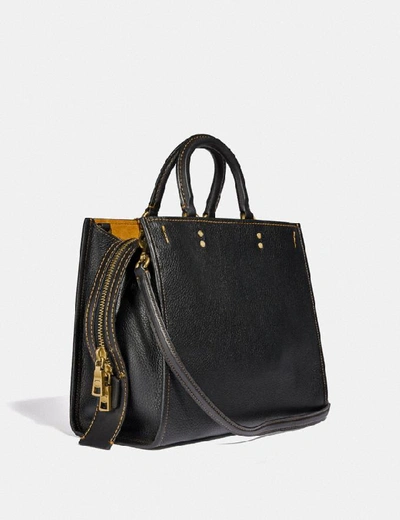 Shop Coach Disney X Rogue With Patches - Women's In Brass/black