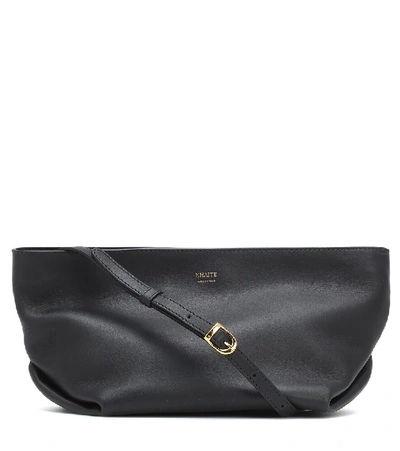 Shop Khaite Adeline Leather Crossbody Bag In Black