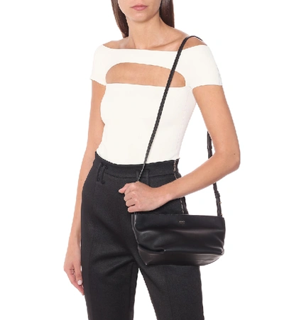 Shop Khaite Adeline Leather Crossbody Bag In Black