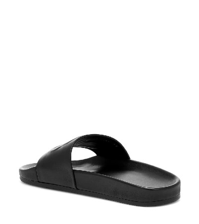 Shop Balenciaga Logo Leather Slides In Black