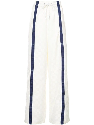 Shop Puma Tearaway Track Pants In White