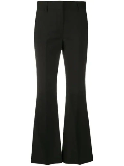 Shop Msgm Mid-rise Flared Trousers In Black