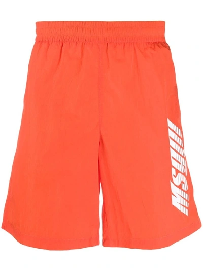 Shop Msgm Logo-print Swim Shorts In Orange