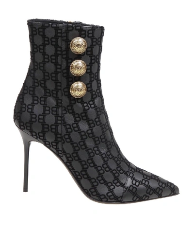 Shop Balmain Roni Ankle Boots In Logo Leather In Black