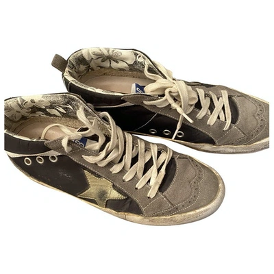 Pre-owned Golden Goose Mid Star Black Leather Trainers