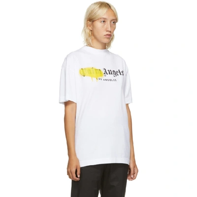Shop Palm Angels White And Yellow Los Angeles Logo Sprayed T-shirt
