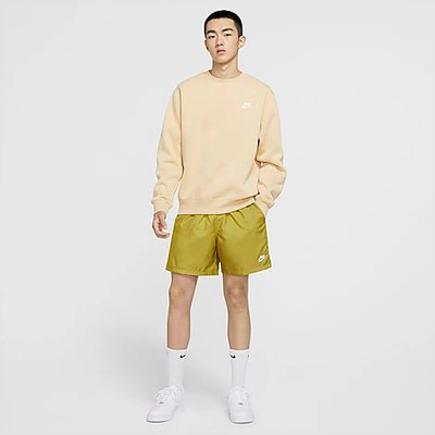 Shop Nike Men's Sportswear Flow Woven Shorts In Yellow