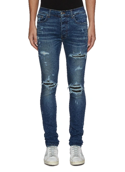 Shop Amiri Quilted Leather Inserts Ripped Skinny Jeans In Blue