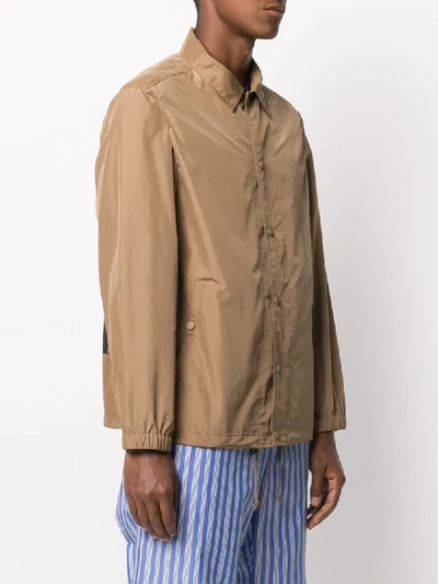 Shop White Mountaineering Letter Print Coach Jacket In Neutrals