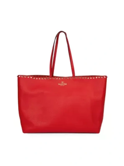 Shop Valentino Garavani Rockstud Leather Tote In Rouge