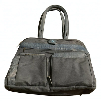 Pre-owned Piquadro Blue Cotton Handbag