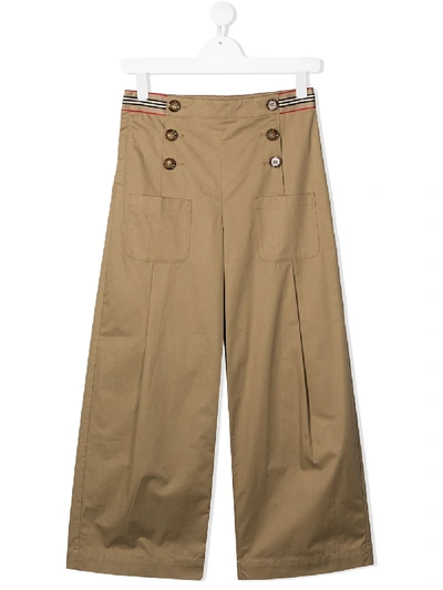 Shop Burberry Teen Tracey Flared Trousers In Brown