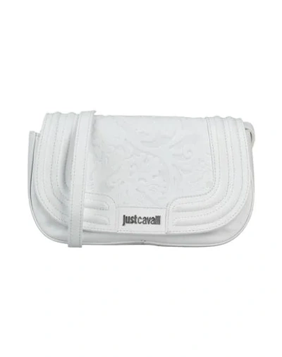 Shop Just Cavalli Cross-body Bags In White