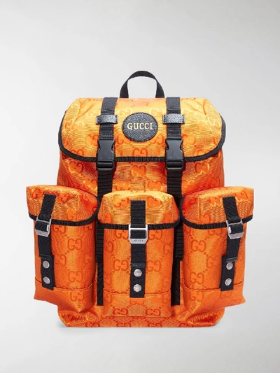 Shop Gucci Off The Grid Gg Multi-pocket Backpack In Orange