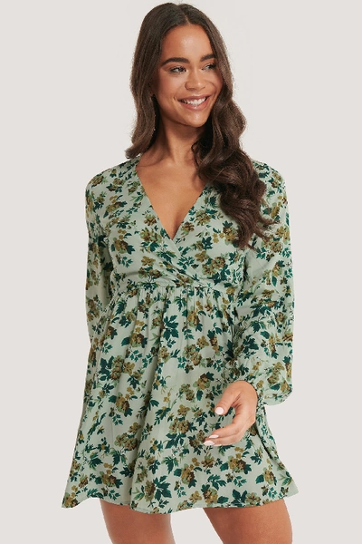 Shop Na-kd Overlap Ls Mini Dress - Green In Green Flower