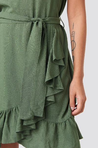 Shop Afj X Na-kd Ruffle Wrap Mini Dress - Green In Khaki