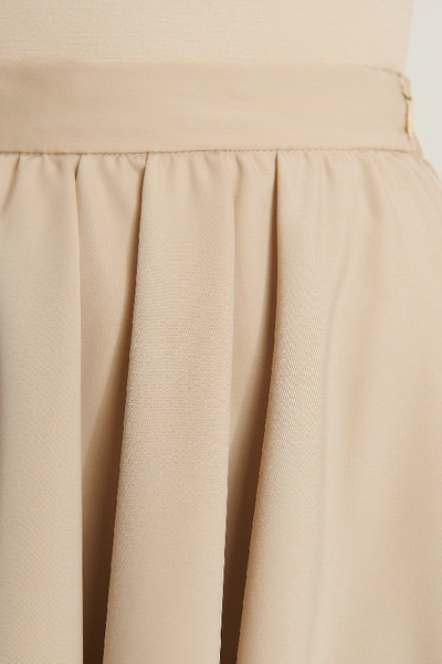 Shop Anika Teller X Na-kd Flounce Mini Skirt Beige