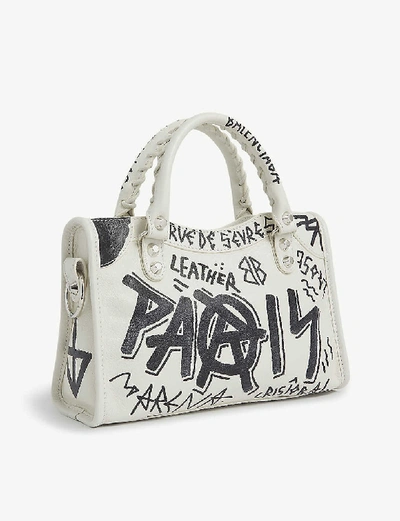 Shop Balenciaga City Mini Graffiti-print Leather Shoulder Bag In White/black