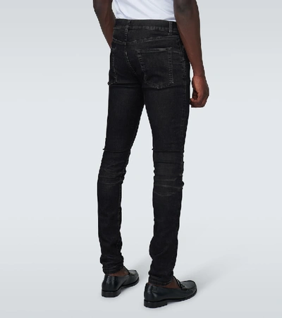 Shop Saint Laurent Skinny-fit Coated Jeans In Black