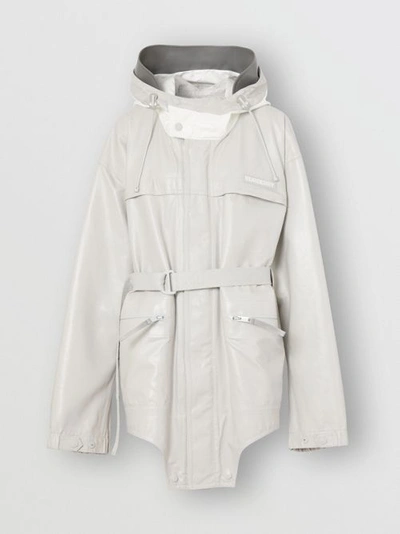 Shop Burberry Cut-out Hem Coated Nylon Parka In Light Pebble Grey