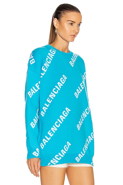 Shop Balenciaga Long Sleeve Logo Sweater In Turquoise & White