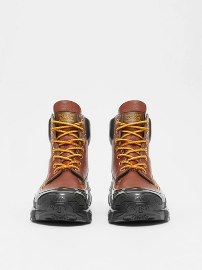 Shop Burberry Contrast Sole Leather Boots In Tan