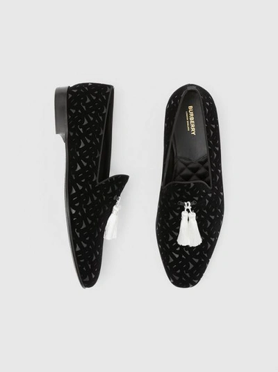 Shop Burberry Contrast Tassel Monogram Flocked Leather Loafers In Black