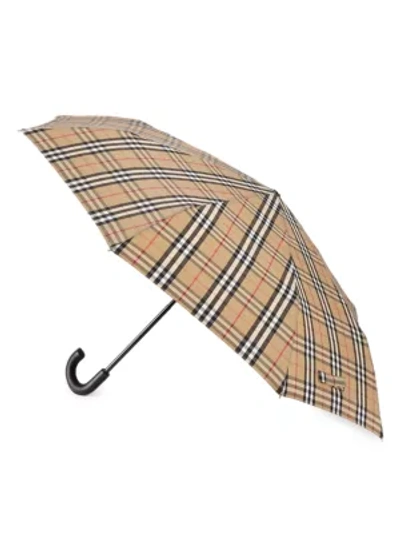 Shop Burberry Women's Folding Trafalagar Check Umbrella In Beige