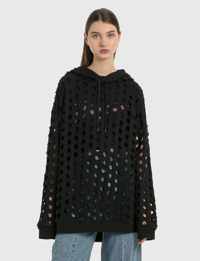 Shop Maison Margiela Punched Oversized Hoodie In Black