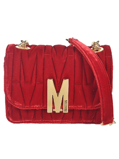 Shop Moschino Engraved Logo M Plaque Shoulder Bag In Red