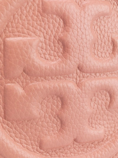 Shop Tory Burch Embossed Logo Clutch In Pink