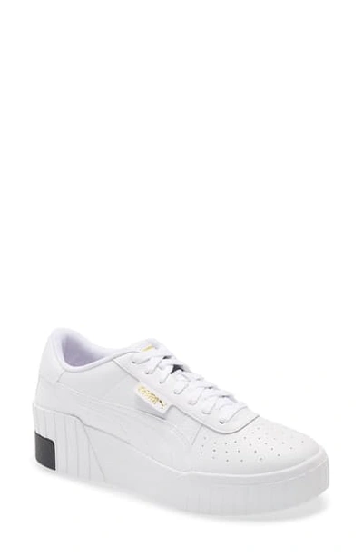 Shop Puma Cali Wedge Sneaker In White/ Black