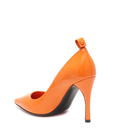 Shop Valentino Rockstud Flair Patent Leather Pumps In Orange