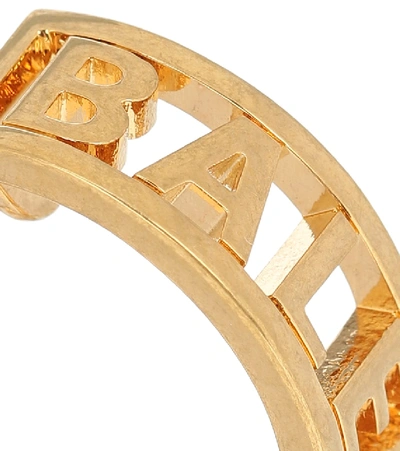 Shop Balenciaga Logo Hoop Earrings In Gold