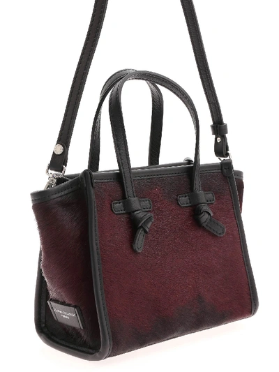 Shop Gianni Chiarini Calf Hair Handbag In Burgundy And Black