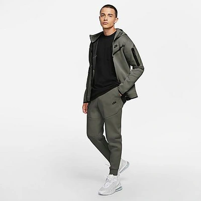 Shop Nike Tech Fleece Taped Jogger Pants In Green