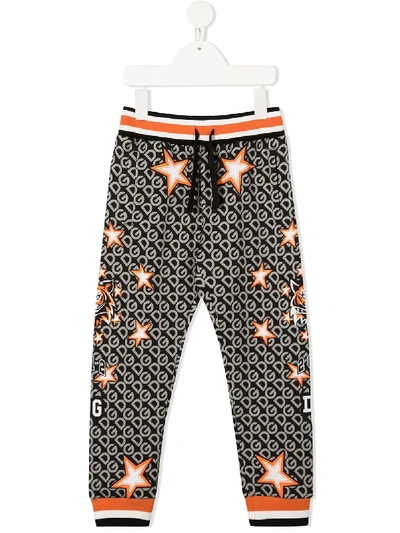 Shop Dolce & Gabbana Dg Star-print Track Pants In Black