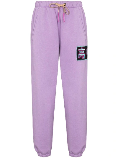 Shop Natasha Zinko Logo-patch Tapered-fit Track Pants In Purple