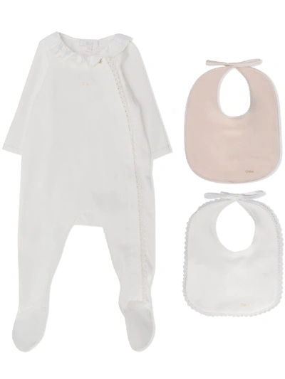 Shop Chloé Ruffle Neck Babygrow Set In White