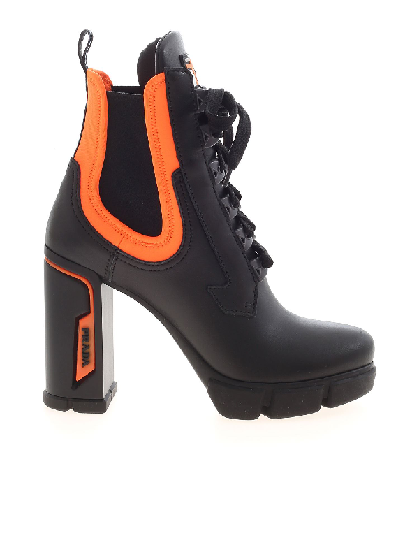 orange and black prada boots