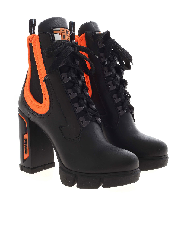 orange and black prada boots