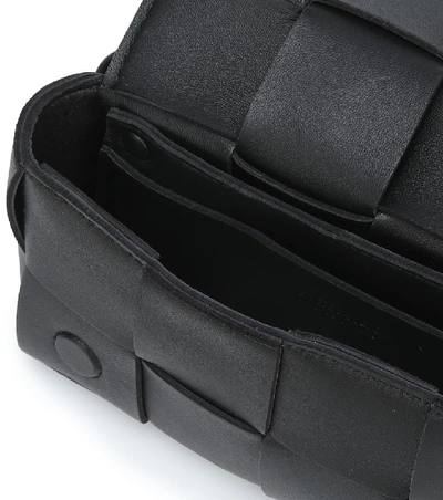Shop Bottega Veneta Cassette Leather Belt Bag In Black