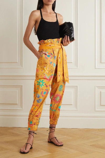 Shop Chufy Belted Printed Cotton-voile Tapered Pants In Mustard
